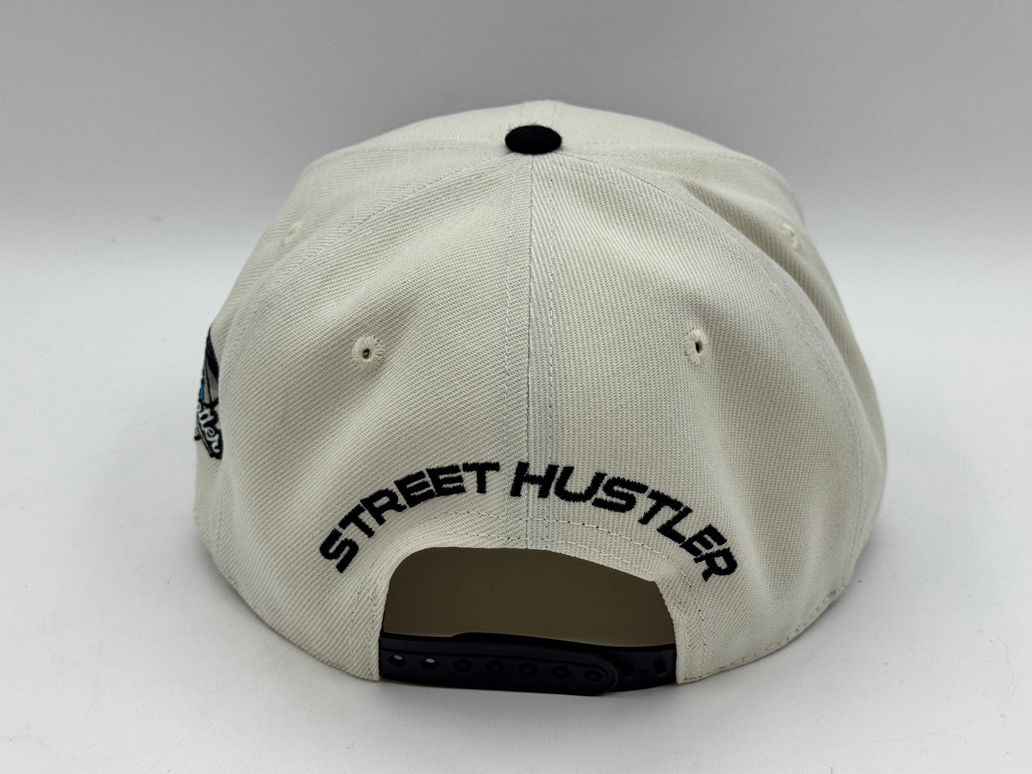 “SH” Single Stooth Snapback – Cream/Black by Street Hustler