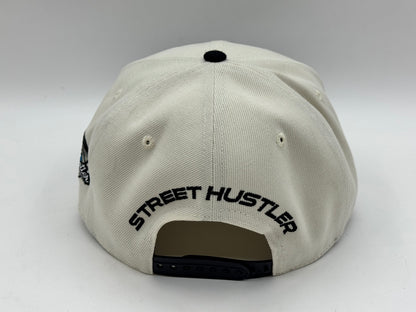 “SH” Single Stooth Snapback – Cream/Black by Street Hustler
