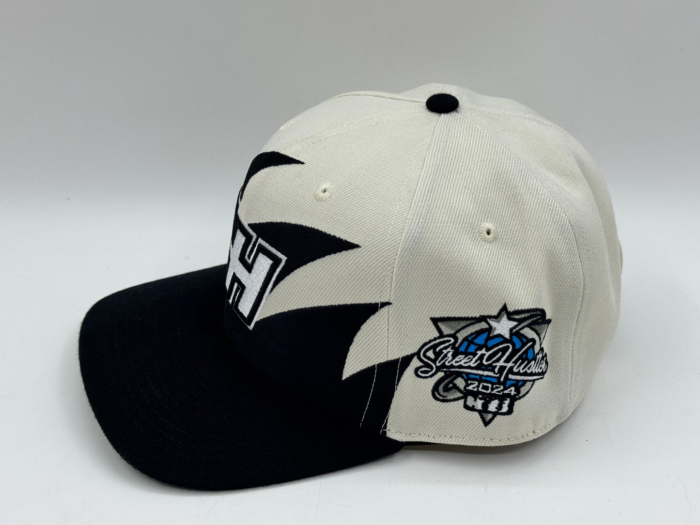 “SH” Single Stooth Snapback – Cream/Black by Street Hustler