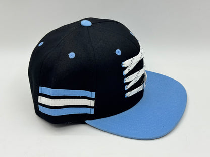 Hockey Lace Snapback Cap – Black / Sky Blue