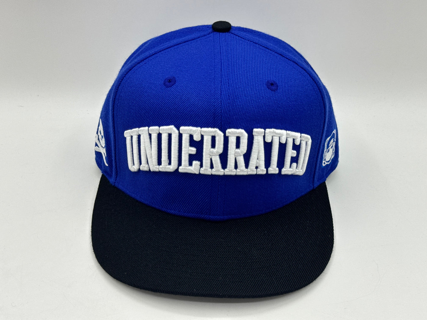 “Underrated” Snapback Cap – Royal Blue / Black by KRWN